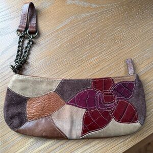 Fossil brown leather purse/wristlet  with chain strap.
